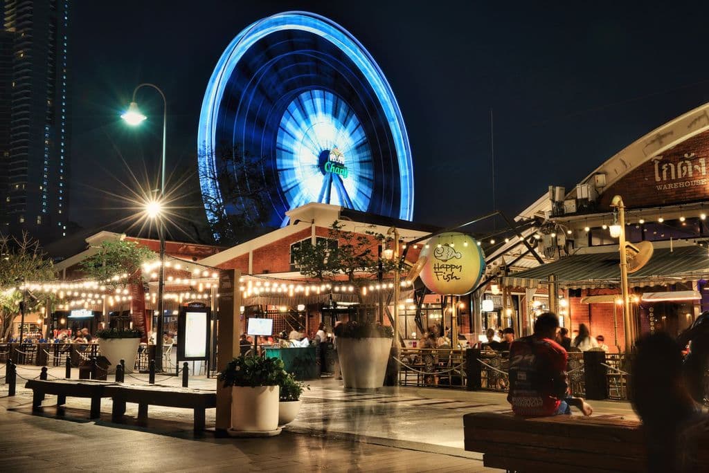 Illuminated Asiatique ferris wheel at night in Bangkok, by allPhoto Bangkok