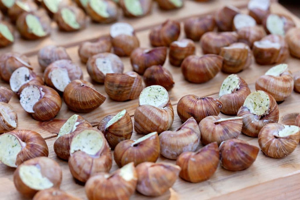 French escargots stuffed with herb butter, by Julia Filirovska