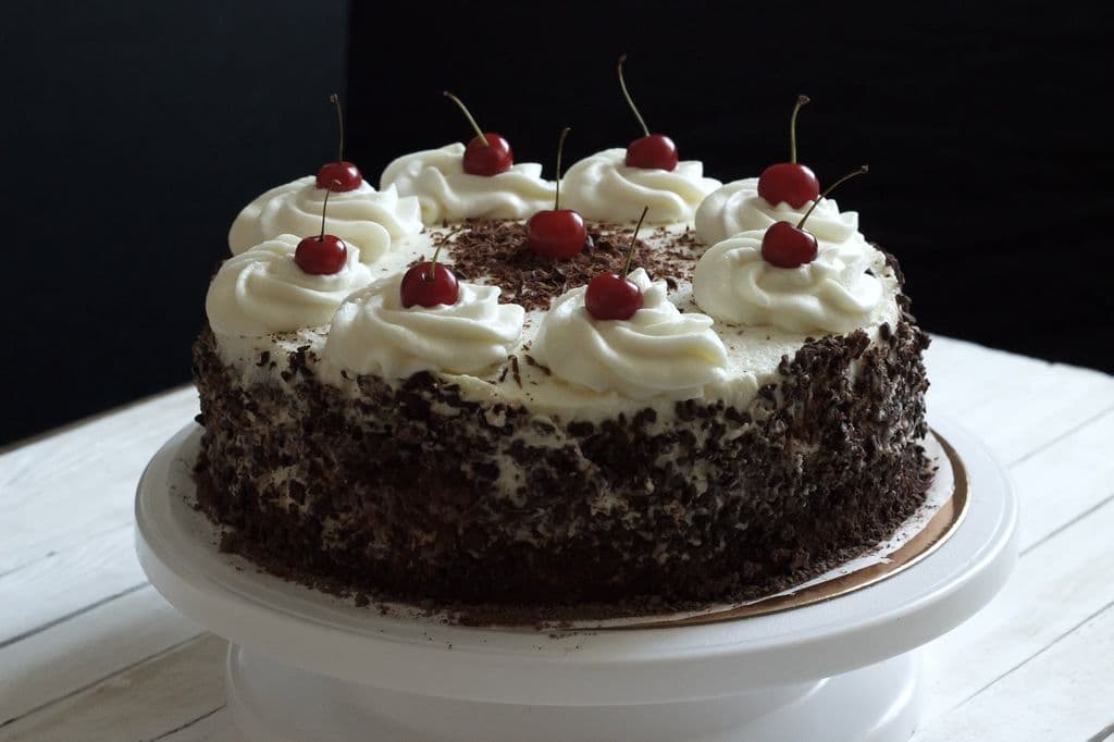 Black Forest cake with cherries and whipped cream, by Сослан