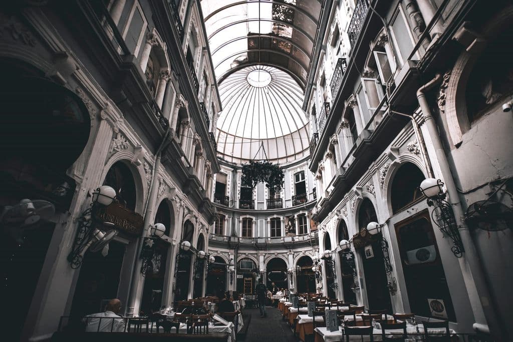 Interior courtyard and glass dome of Çiçek Pasajı in Istanbul, by Zafer Erdoğan