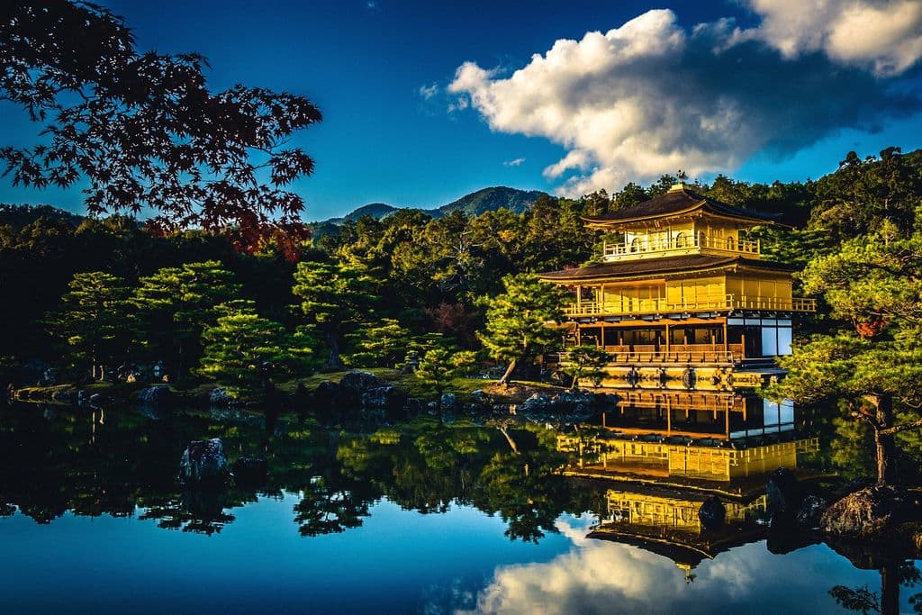 Kinkaku-ji Golden Pavilion beside the pond in Kyoto, by Erik Eastman