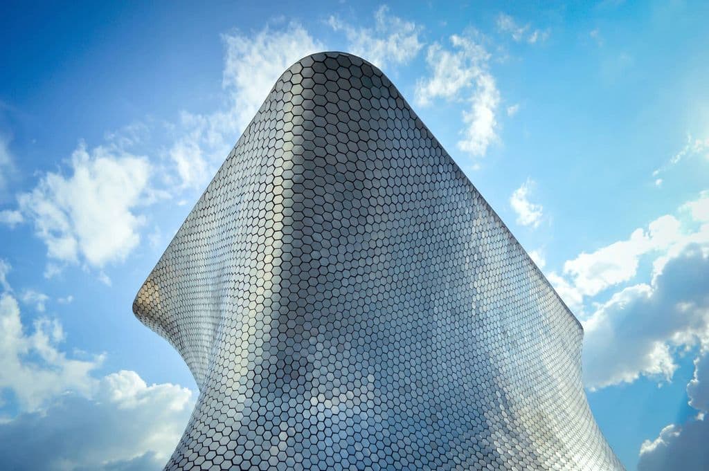 Low-angle view of Museo Soumaya in Mexico City, by Arantxa Treva
