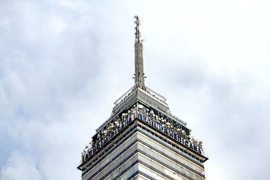 Low-angle view of Torre Latinoamericana in Mexico City, by Denisse Leon