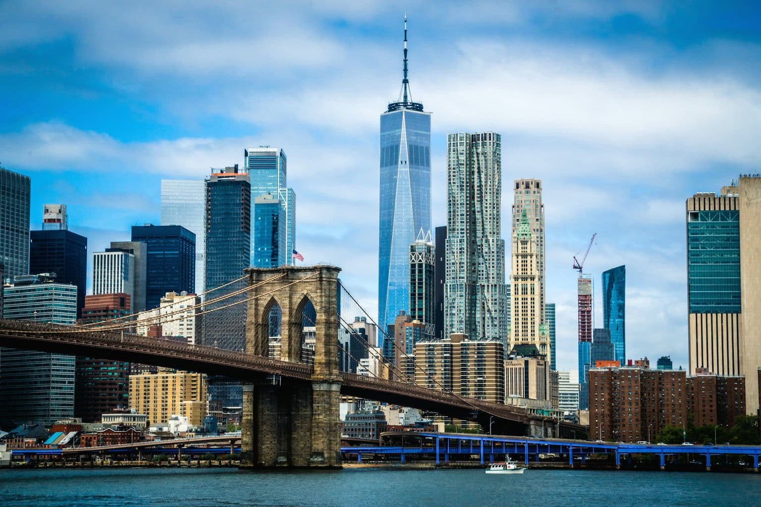 Brooklyn Bridge and Lower Manhattan skyline in New York City, by Chase Baker