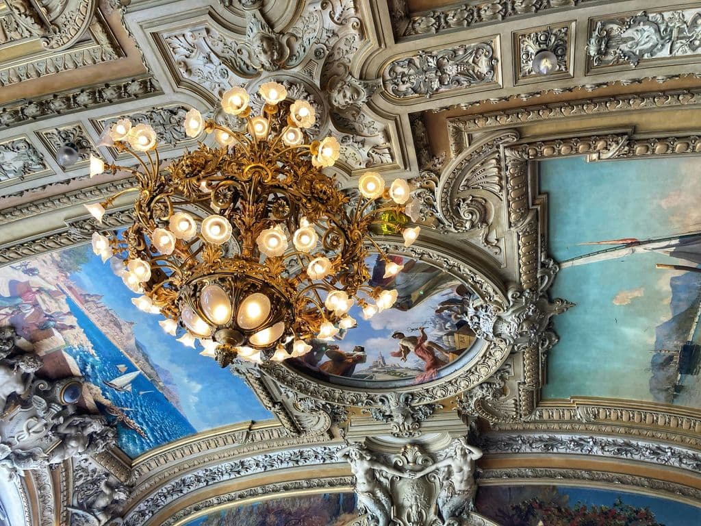 Ornate ceiling detail at Le Train Bleu in Paris