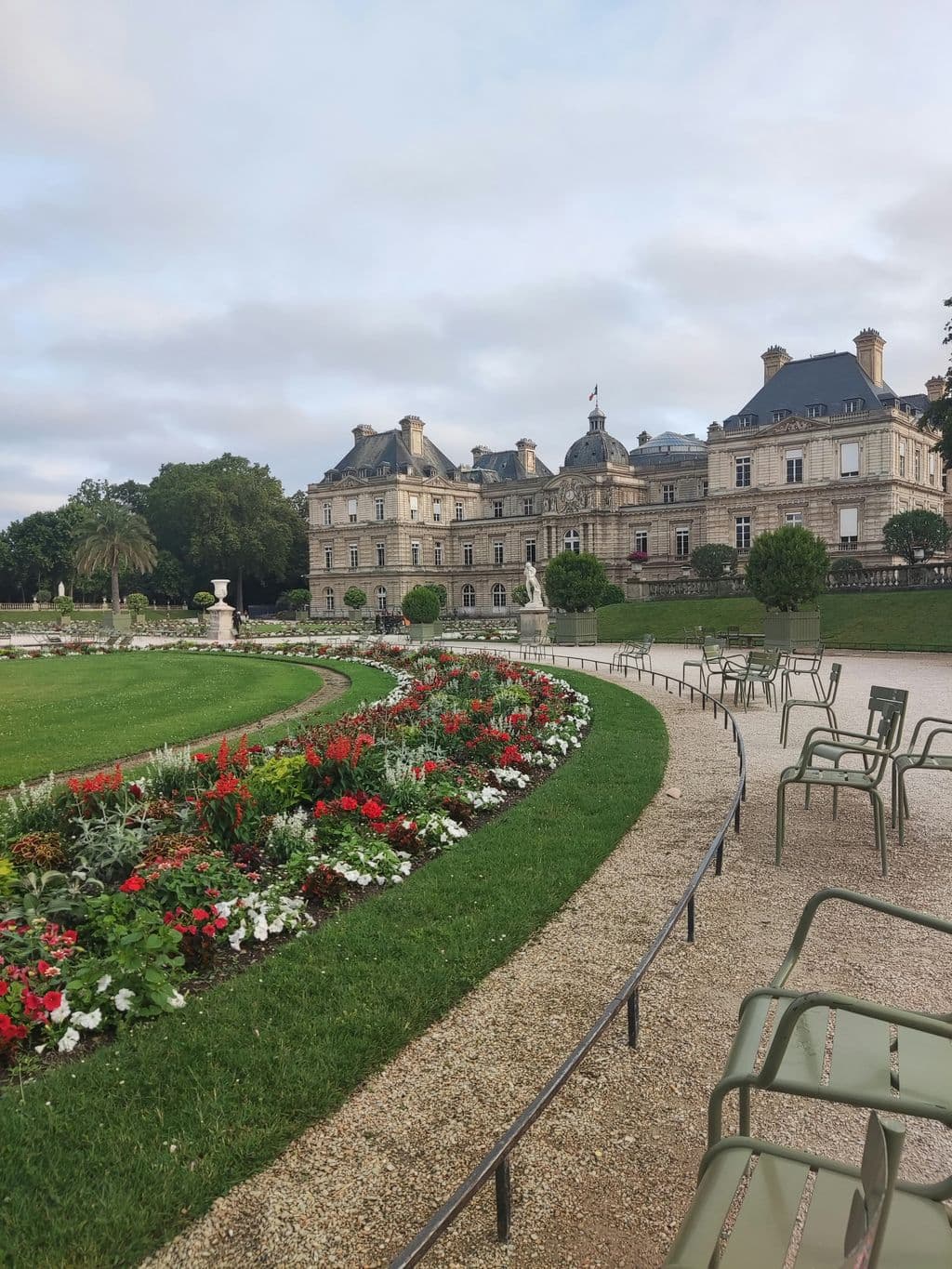 Green chairs in Luxembourg Gardens in Paris, by Amada MA