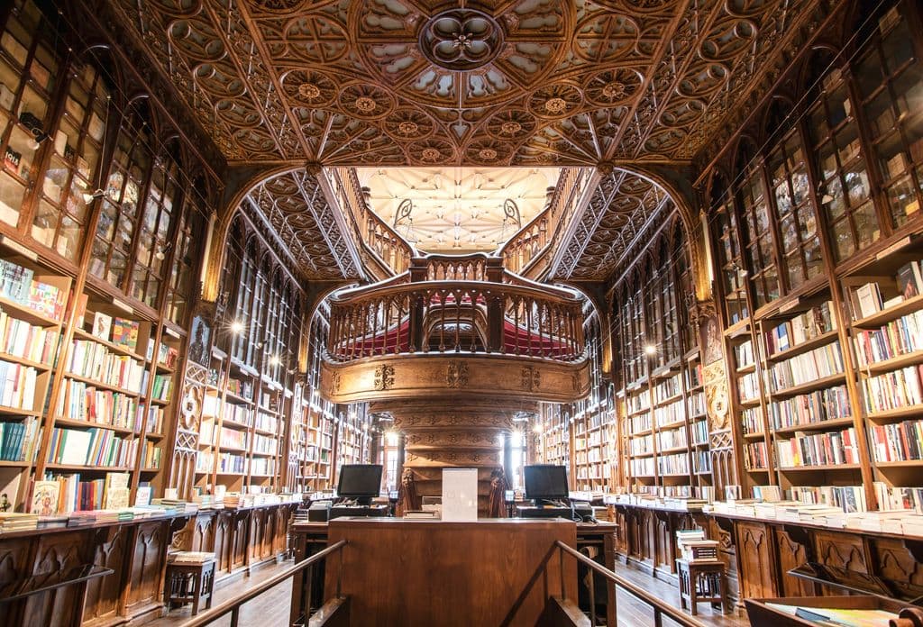 Livraria Lello bookshelves and staircase in Porto, by Ivo Rainha