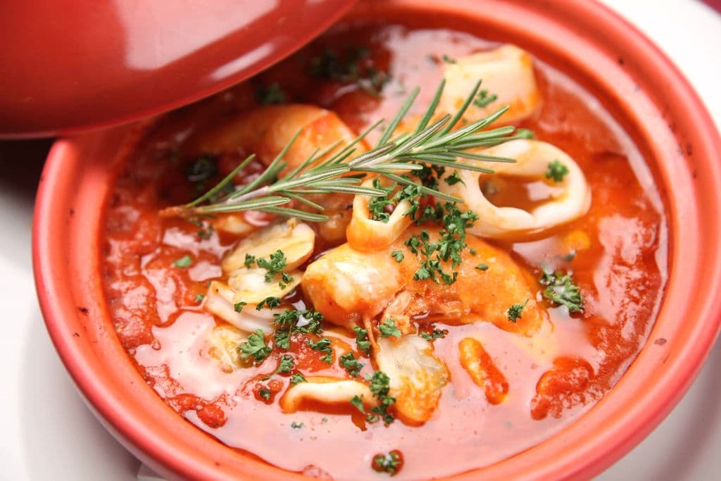 Seafood stew in tomato sauce, by Zak Chapman