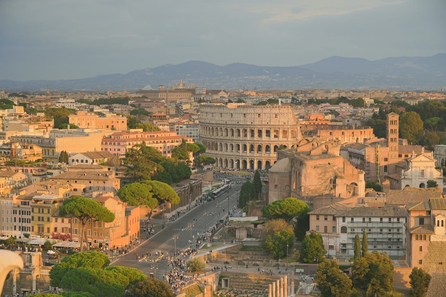 Aerial view of the Colosseum and Rome at sunset, by Paul Scheelen