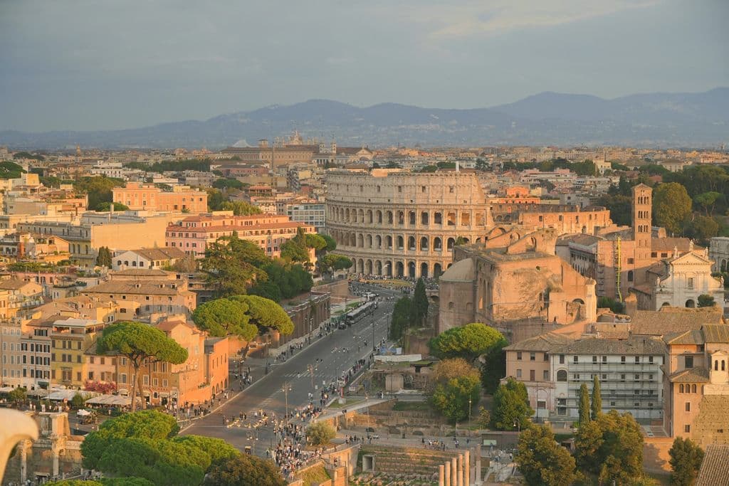 Aerial view of the Colosseum and Rome at sunset, by Paul Scheelen