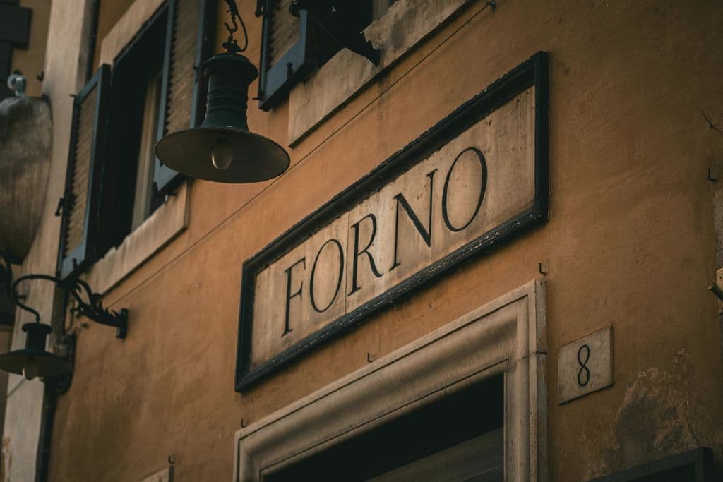 Forno bakery sign on a historic Rome street, by Ömer Gülen