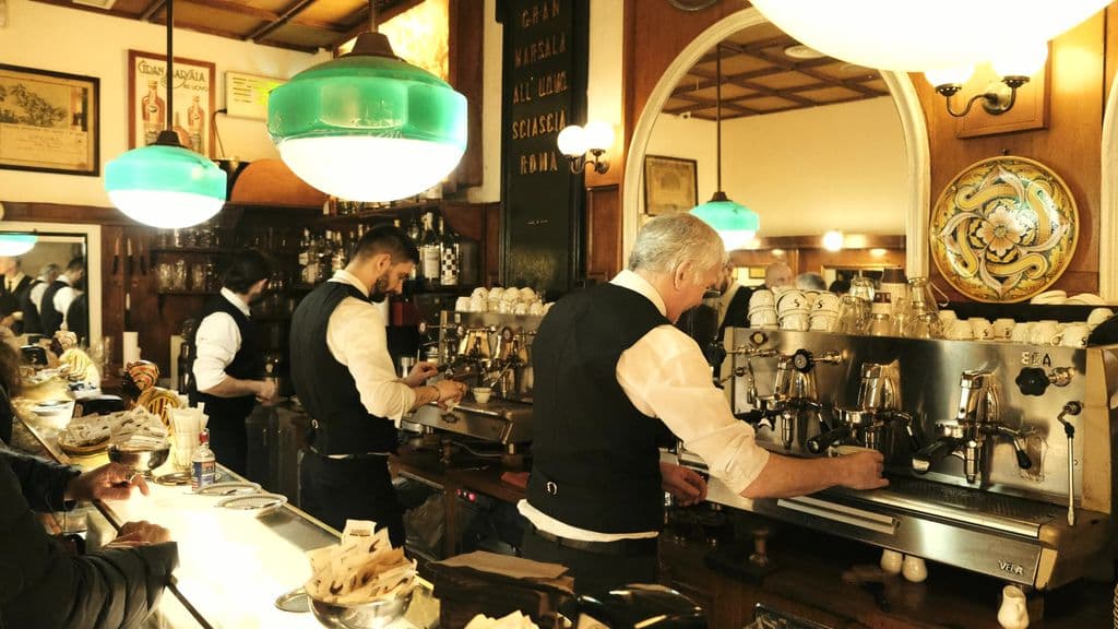 Baristas preparing coffee at Sant’Eustachio Il Caffè in Rome, by Can İğdeli