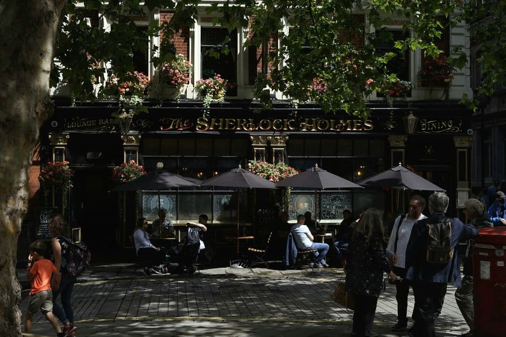 People outside Rules restaurant in London, by Loujane Alasi