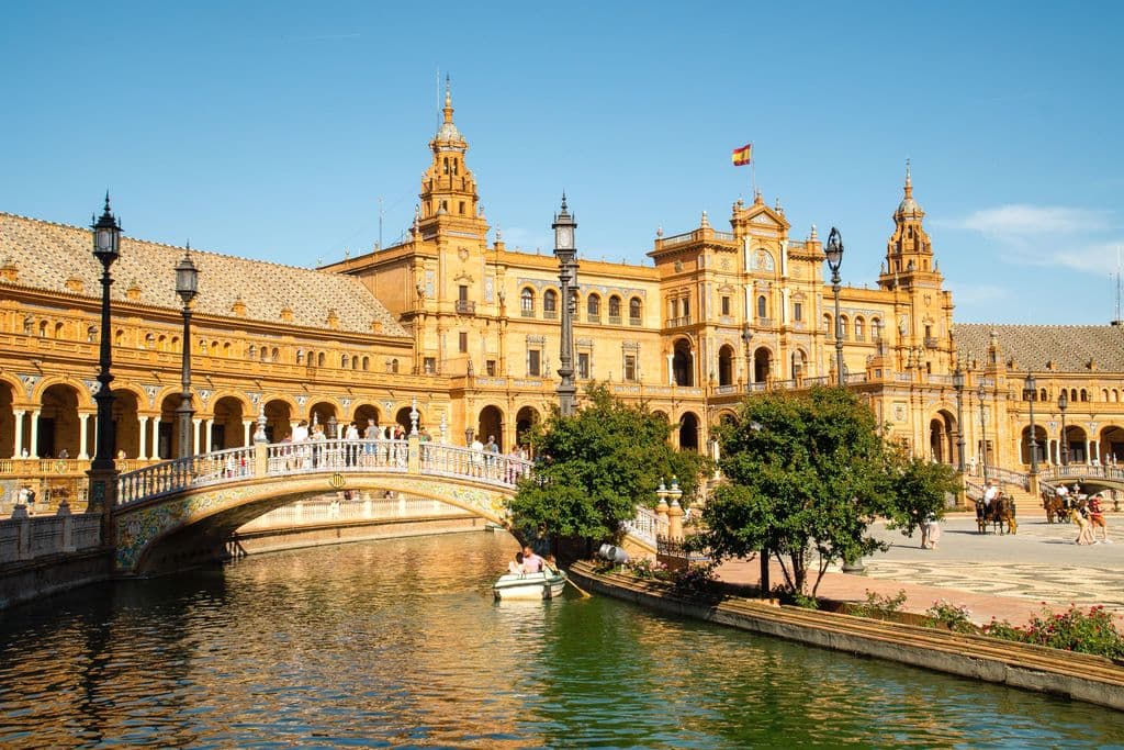 Plaza de España in Seville on a sunny day, by Jose Rodriguez Ortega