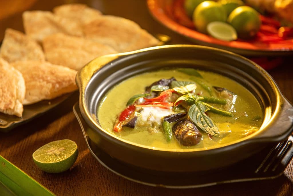 Thai green curry with vegetables and herbs, by Sai Kuen Leung