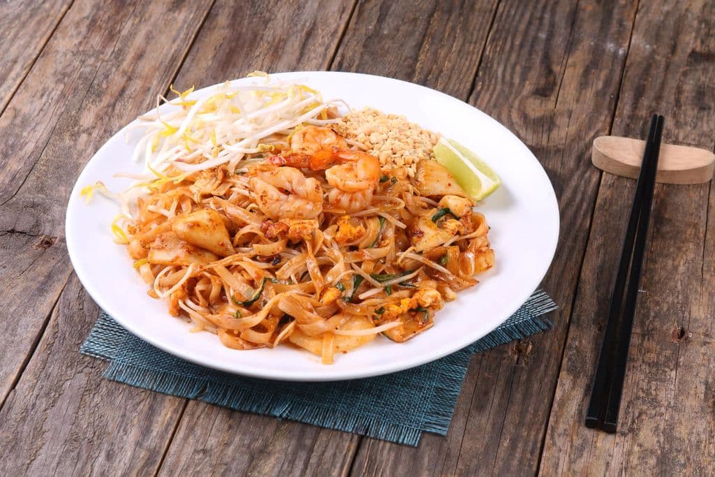 Pad Thai with shrimp, peanuts, lime, and bean sprouts, by UNDO KIM