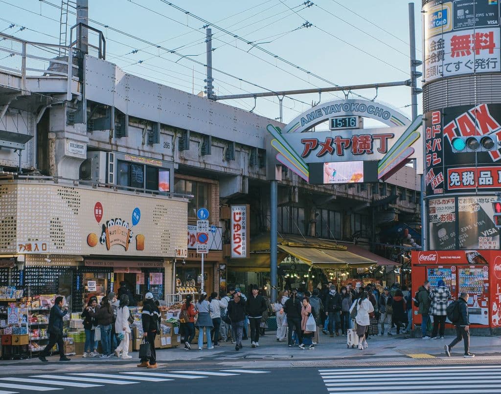 Busy Ameya-Yokocho market in Tokyo, by Huy Phan