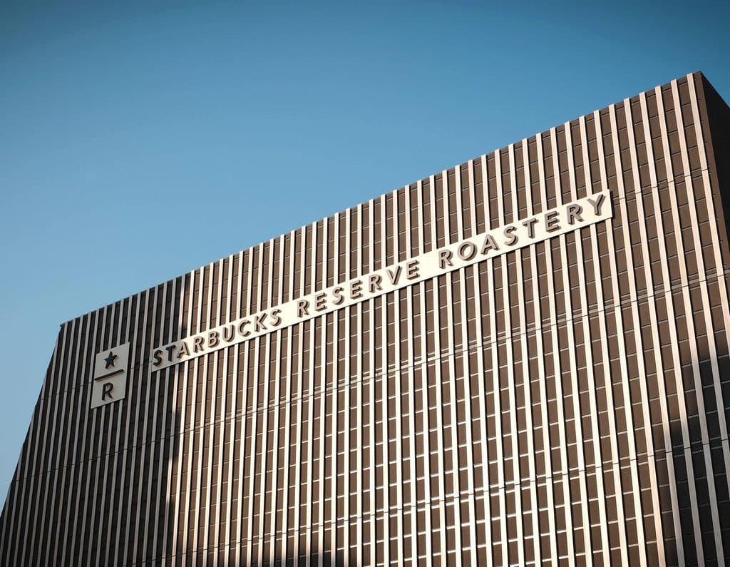 Starbucks Reserve Roastery Tokyo exterior under a blue sky, by Hakan Nural