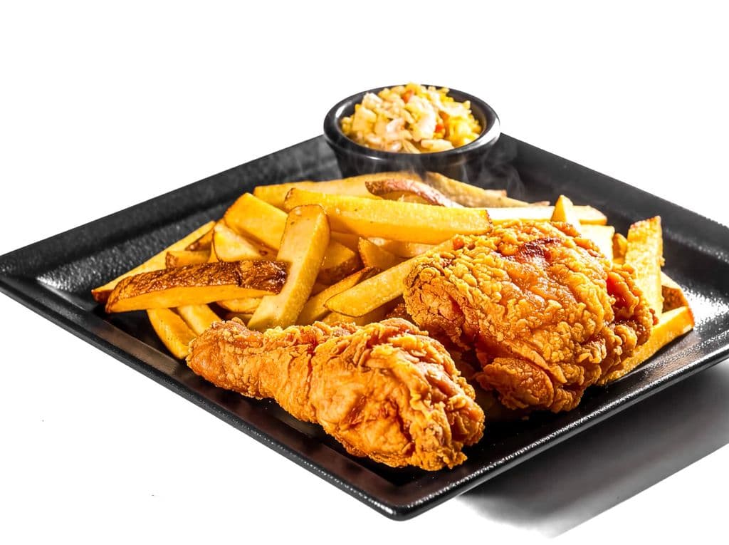 Crispy fried chicken with fries and coleslaw, by Cristian Arteaga