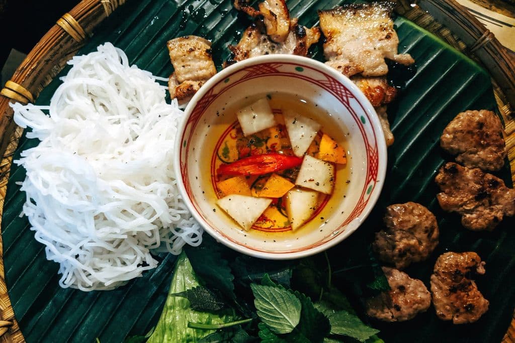 Bún chả with grilled pork, noodles and fresh herbs, by Markus Winkler